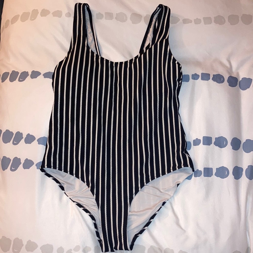 Black and white striped one piece bathing suit
